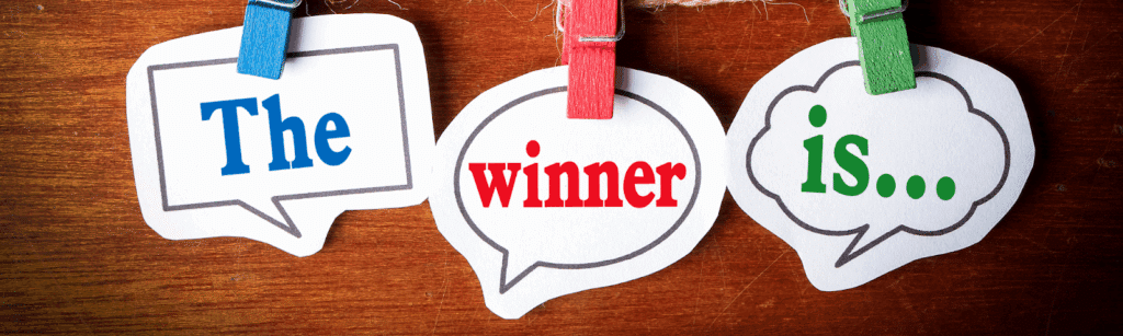  Dialog boxes showing “The winner is…”, representing a contest for user-generated content on social media.
